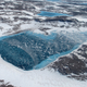 Illustration for article titled Melt Ponds on Ice Sheets Are Chillingly Beautiful